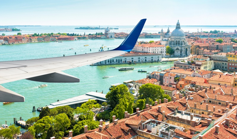 business class flights to italy